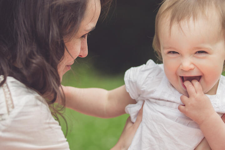 Grandmother observing her grandchildren playing during a fun and relaxed lifestyle photo session in Lincolnshire